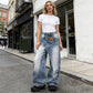 👖 57% DE RÉDUCTION 💙 Jean femme taille asymétrique jambe large – Coupe 3D, lavage décoloré & silhouette ultra large – Tailles S-2XL – idéal streetwear ou mode affirmée ✨